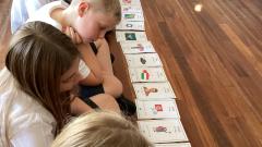 Children looking at a timeline of world war 2