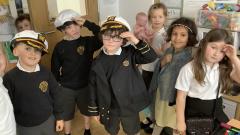 Class 2 children dressed up as passengers from The Titanic