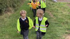 Children walking to the allotment