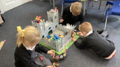 Children playing with castle 