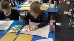 Class 3 enjoying the maths investigation with concrete resources.
