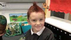 Boy with spiked red hair