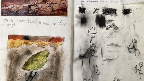 Child’s sketchbook experimenting with different media to recreate stone age art as well as using charcoal to experiment with sketching techniques