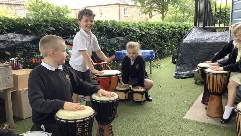 Children playing drums 