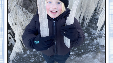 Boy holding icicle
