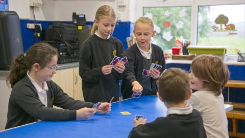 Playing Uno at After School Club