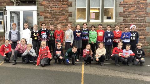 photo of class 4 in christmas jumpers