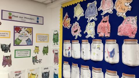 Classroom display boards with pictures of monsters
