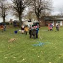 The whole of class 3 in their groups working hard to build their dens