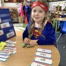 Girl dressed as supergirl