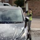 Boys cleaning car