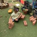 Children playing as builders 