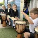 Children playing drums 