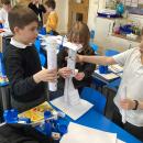 Children experimenting with paper structures