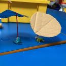 Umbrella designs for small toy frogs