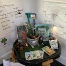 Display showing small world play and tree
