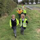 Children walking to the allotment