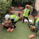 Children playing as builders
