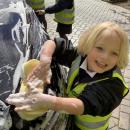 Boy cleaning car