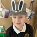 A child wearing an easter bonnet decorated as a bunny