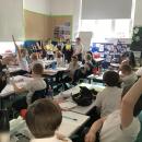children sitting in classroom